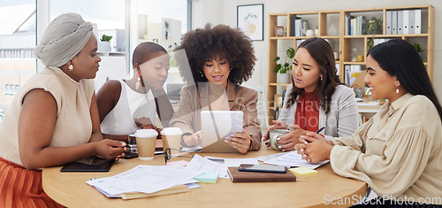 Image of Teamwork, meeting and business women with tablet in office for brainstorming, discussion or planning. Technology, cooperation and group of people or employees with touchscreen for marketing strategy.