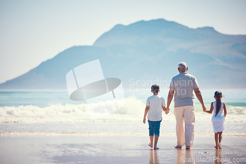 Image of Holding hands, relax and grandfather with children at beach for holiday, bonding and vacation mockup. Affectionate, travel and happiness with old man and kids walking for summer break, fun or support