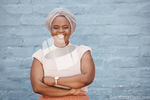 Image of Portrait, smile and black woman with arms crossed on brick wall background with mockup. Happiness, professional and confident, proud and African person, business or female entrepreneur from Nigeria.