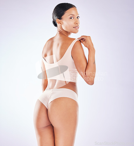 Image of Skincare portrait, woman beauty and butt in a studio with wellness, underwear and fitness. Cosmetics, liposuction and cellulite treatment of a female with skin glow with isolated white background