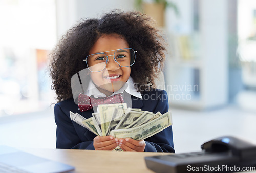 Image of Business, girl child in office and cash, smile and glasses, education in money management or budget planning. Portrait of corporate kid in suit, accounting and investing in future finance with kids.