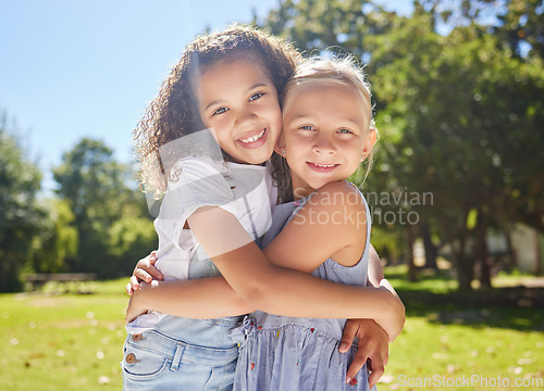 Image of Summer camp, portrait or happy children hugging in park together for fun, bonding or playing in outdoors. Fun girls, diversity or young best friends smiling or embracing on school holidays outside