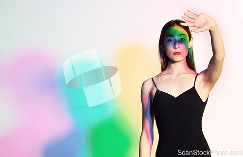 Image of Light, beauty and fashion with portrait of woman in creative, aesthetic or neon glow. Kaleidoscope, cosmetics and disco with model and cmyk color for designer, art or party on white background