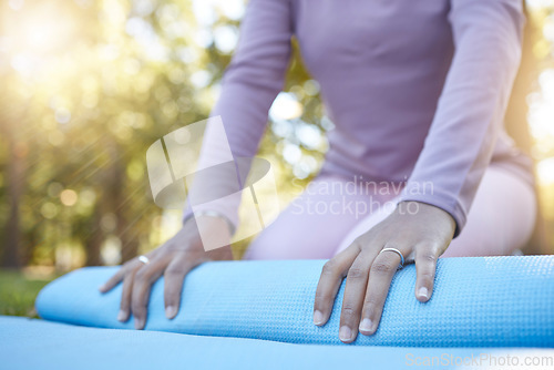 Image of Fitness, woman and hands with yoga mat for spiritual wellness, zen workout or pilates in nature. Closeup of female yogi getting ready for calm, peaceful meditation or exercise at an outdoor park