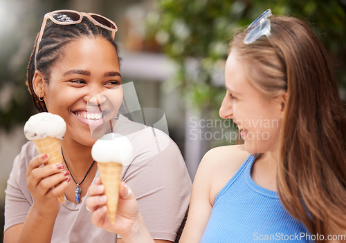 Image of Friends eating ice cream, happiness and dessert outdoor, travel with freedom, snack and smile while on holiday. Diversity, happy and eat gelato, summer and together with women bonding in Italy