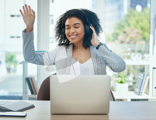 Image of Happy woman, dancing and music headphones by office laptop for fun, energy or corporate motivation. Smile, dance and worker listening to audio, podcast or radio on business technology or headset app