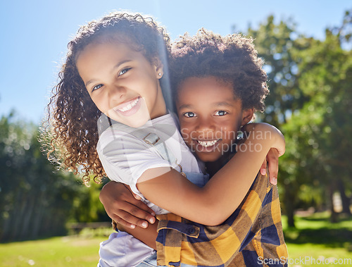 Image of Portrait, kids and friends hugging in a park together for fun, bonding or playing in summer. Hug, children or diversity with girl and boy best friends embracing in a garden during the day