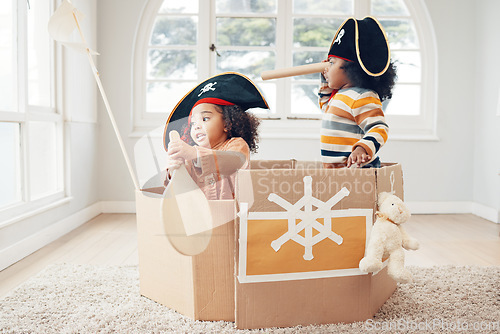 Image of Playing, box boat and pirate children role play, fantasy imagine or pretend in cardboard container. Telescope, fun home game or sailing black kids on Halloween cruise adventure with yacht captain