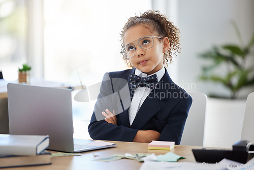 Image of Bored, kid and thinking with pretend office work and laptop with ideas. Job, child and little girl playing dress up as working executive at desk with paperwork and eyes rolling feeling annoyed