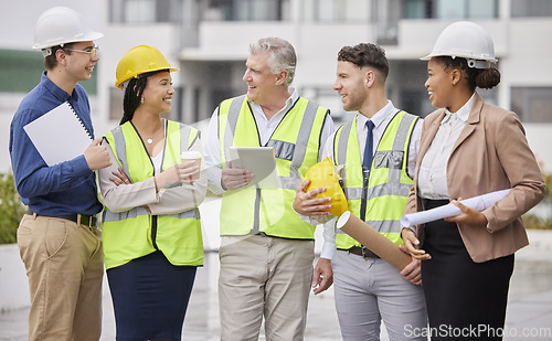 Image of Construction site, team and meeting at a building for planning, creative and collaboration. Architecture, business people and designer group with blueprint, documents and engineering development plan