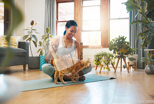 Image of Home fitness, yoga or happy woman with cat or pet animal relaxing for wellness or healthy lifestyle. Smile, calm or active zen girl loves bonding, caring or playing with kitten or kitty in house