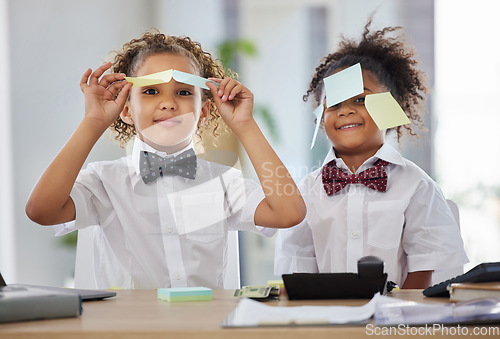 Image of Kids, together and playing office with sticky note in portrait with happiness, brainstorming and teamwork. Siblings, girl and happy with paper, planning or play as business people for bond with games