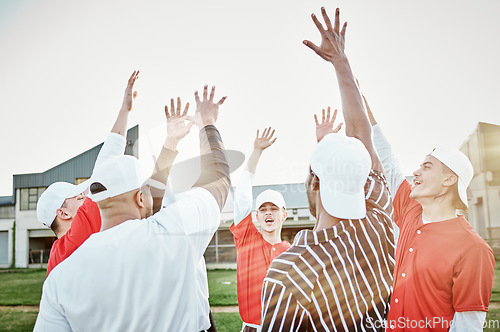 Image of Hands up, motivation or baseball people in huddle with support, hope or faith on sports field in game together. Teamwork, happy people or group of excited softball athletes with goals or solidarity