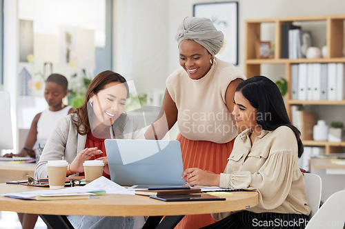 Image of Business women, laptop work and digital collaboration of a web analytics group in a office. Teamwork, solidarity and online agency of female staff in a meeting with website solution and data