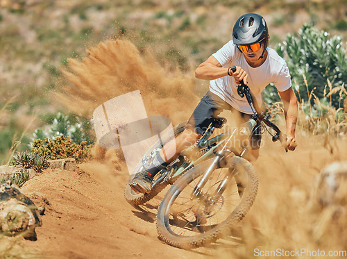 Image of Cycling, trail and sports with man on mountain bike for adventure, fitness and adrenaline junkie. Exercise, risk and fast with male athlete riding in nature for workout, training and action speed