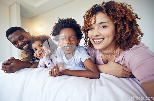 Image of Portrait, selfie and happy family relax in bed, smile and cheerful in the home during morning together. Face, photo and children resting indoors with parents and pose for profile picture and memory