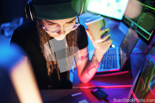 Image of Coffee, computer or girl hacker in night office for coding, phishing or researching blockchain tech. Pc data, programmer or woman hacking online in digital cybersecurity on global website or internet