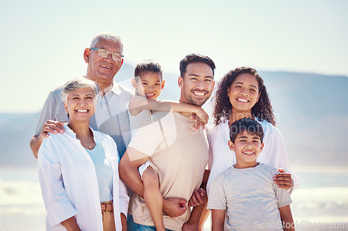 Image of Big family, portrait of grandparents and kids with parents, smile and happy bonding together on ocean vacation. Sun, fun and happiness for generations of men and women with children on beach holiday.