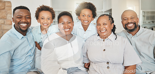 Image of Happy, bonding and portrait of a black family on a sofa for happiness, visit or quality time. Smile, group and African parents, children and grandparents on a couch for generations in the lounge