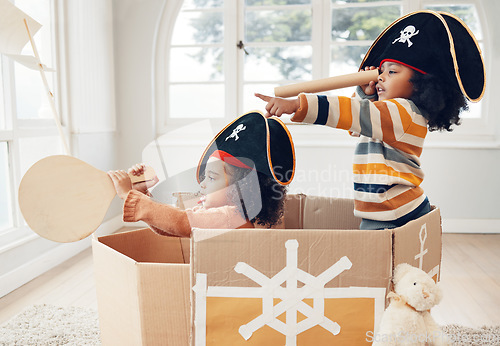 Image of Pirate, box and playing with children in living room for bonding, imagine and creative. Happy, youth and siblings with girls sailing in cardboard ship in family home for relax, fantasy and games