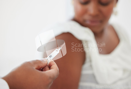 Image of Hand, covid vaccine and a patient with her doctor in the hospital for an injection of medicine or antibiotics. Healthcare, medical and a consulting with a male medicine professional holding a syringe