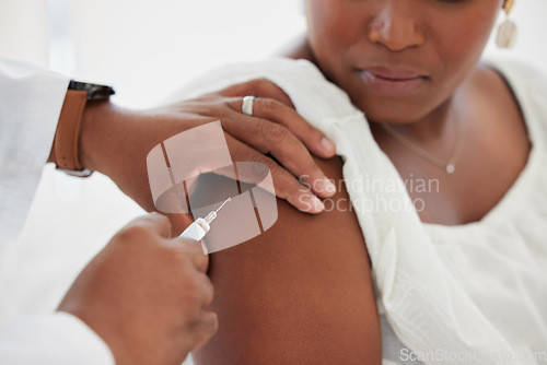 Image of Hand, covid vaccine and a woman with her doctor in the hospital for an injection of medicine or antibiotics. Healthcare, medical and a consulting with a male medicine professional holding a syringe