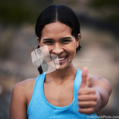 Image of Woman, portrait or happy thumbs up for fitness win, training motivation or exercise achievement in nature park. Smile, face or runner with thumb for workout vote, wellness support or sports success