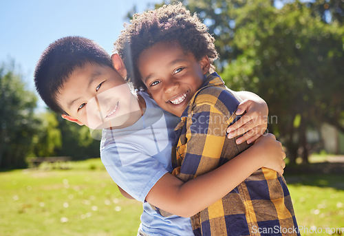 Image of Portrait, children and friends hugging in a park together for fun, bonding or playing in summer. Hug, kids and diversity with boy best friends embracing in a garden in the day during school holidays