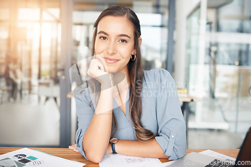 Image of Woman designer, portrait and smile at desk in office for paperwork, pride or expert engineering in Canada. Happy young female architect at desk with confidence of planning strategy in startup company