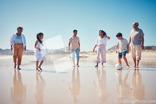 Image of Family soccer, beach holiday and kids running by the sea with happiness and freedom. Football, young girl and parents walking by ocean in summer on vacation with children on the sand with a smile