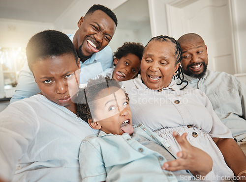 Image of Funny, goofy and selfie of black family make joke with faces in a home or house while on vacation or holiday. Social media, mother and father with children and grandparents happy bonding with humor