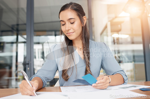 Image of Business woman writing documents at office desk of administration, strategy solution or project notes. Female worker planning paperwork, ideas or management of professional company reports in startup