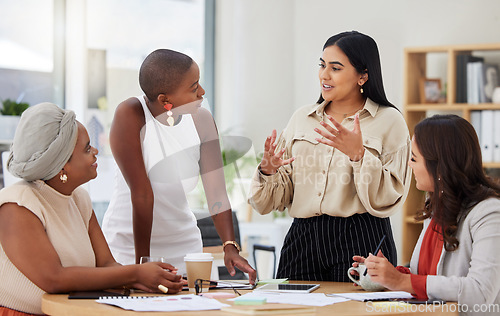 Image of Diverse group, teamwork and young business women brainstorming, collaboration or cooperation. Ambitious confident professional team of colleagues talking and planning a marketing strategy together