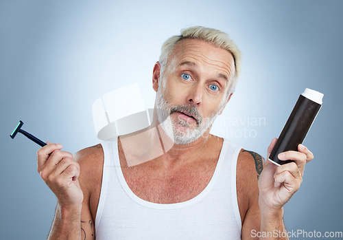 Image of Shave, confused and portrait of a senior man in studio thinking with grooming razor. Isolated, grey background and elderly male model with hygiene, shaving cream and skincare routine with doubt