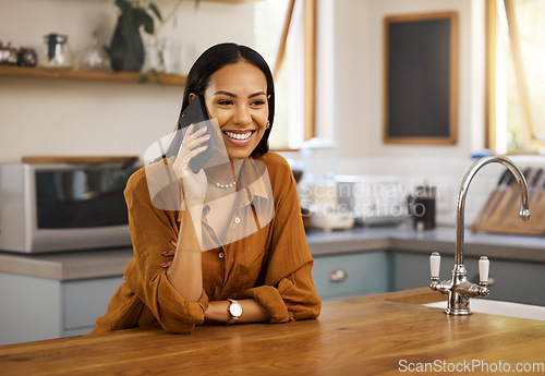 Image of Smile, kitchen and phone call, latino woman networking for freelance job or remote work in home. Chat, connect and communication with home lifestyle, morning conversation on smartphone in apartment.