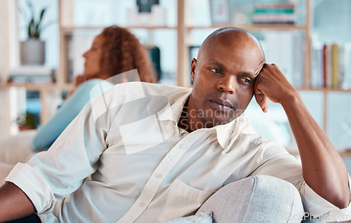 Image of Frustrated couple, crisis and man on sofa for marriage problem, drama and bad communication in lounge. Divorce, argument and fighting with angry partner, conflict and erectile dysfunction crisis