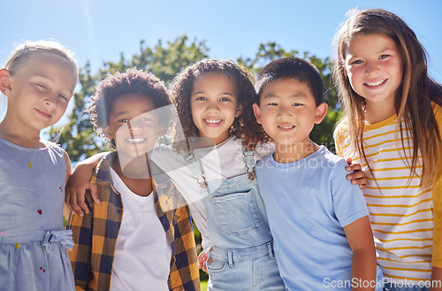 Image of Friendship, kids and portrait of friends in a park playing together outdoor in nature. Happiness, diversity and children with a smile standing, embracing and bonding in a outside garden or playground