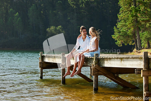 Image of Lake, love and couple on vacation, summer and break for quality time, bonding and loving together. Romance, man and woman in nature, forest and romantic getaway for rest, relationship and happiness