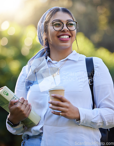 Image of Study, book and happy woman at park, university campus or outdoor distance learning, education and reading. Gen z muslim, islamic or arabic student with school ideas for research or college knowledge