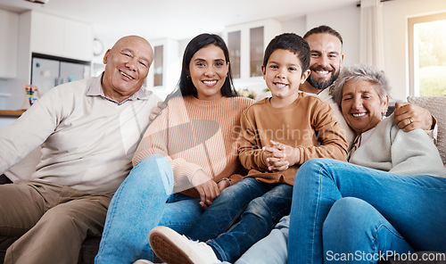 Image of Relax, portrait and generations of family on sofa together, laughing and smiling in interracial home. Men, women and happy children on couch with grandparents, parents and kid in house living room.