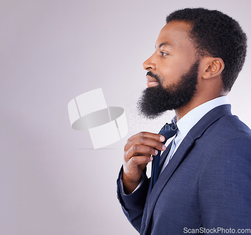 Image of Black businessman tie dressing and studio background with business mindset isolated in mockup space. Success, pride and profile of confident African man in suit, successful leader in corporate Africa