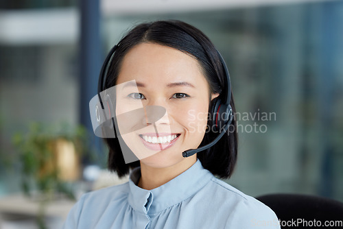 Image of Asian woman, call center employee and smile in portrait, communication and CRM, headset and headshot. Contact us, customer service or telemarketing with sales, happy female consultant and help desk