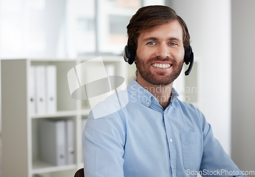 Image of Smile, customer support and portrait of man at call center for b2b connection, contact us and crm consulting at desk. Telemarketing, communication and male worker for friendly service, trust and help