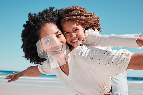 Image of Portrait, mother and girl at a beach for airplane, game and bonding, happy and excited for travel, playing or family summer on blue sky. Face, piggyback and mom with child at a sea in Mexico