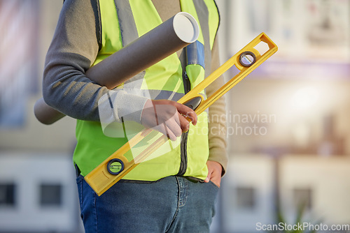 Image of Man hands, level and architect blueprint, real estate developer or property contractor for building development. Civil engineering, architecture or construction worker with infrastructure floor plan