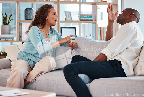 Image of Couple, fight and argue on sofa for marriage problems, breakup or bad communication in lounge. Divorce, crisis and frustrated people in conflict, angry partner and betrayal of cheating, drama or hate