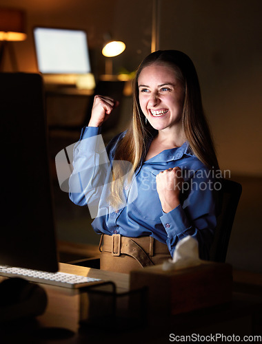 Image of Night, computer and winning business woman celebrate stock market profit, company sales news or bonus online. Winner, celebration and yes of happy person reading for global trade or trading results