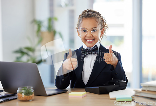 Image of Success, winner and child with thumbs up on laptop for achievement, victory and office results. Business, education and young girl on computer with hand gesture smile, happy and excited for goals