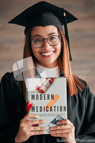 Image of Doctor graduate, woman portrait and medical textbook of a young student happy from graduation. Learning book, happiness and excited female ready for university education with a smile from knowledge