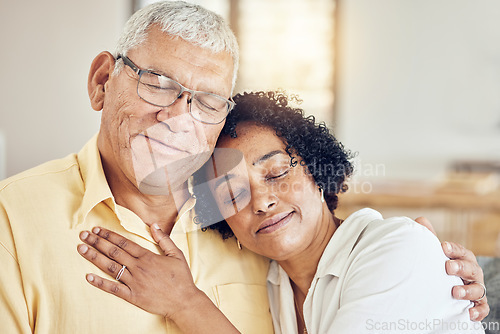 Image of Elderly love, relax and couple hug, care and enjoy quality bonding time on home living room sofa. Retirement peace, marriage support or romantic senior husband, wife or calm people together in Brazil